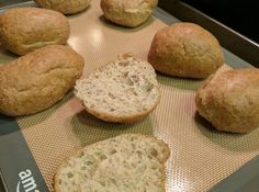 several loaves of bread on a baking sheet