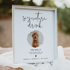 there is a sign that says signature drink with a photo of a dog on it