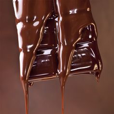 two chairs covered in melted chocolate on top of each other