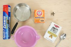 the ingredients needed to make an ice cream dessert are shown on a wooden table top