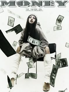 a woman sitting in a chair surrounded by money