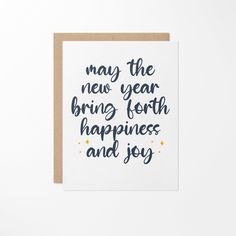 a card that says, may the new year bring forth happiness and joy