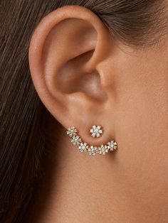 It simply doesn't get prettier than the Flor Ear Jackets! There's so much styling potential with these handcrafted, floral inspired accessories. 18K Gold Plated Sterling Silver Casting & Posts Cubic Zirconia Stones Post Back Hypoallergenic Keep away from any moisture and liquids Measurements: Length: .85" Width: .65" Weight: .05 oz. Get Prettier, Simple Gold Earrings, Silver Casting, Ear Crawler Earrings, Crawlers Earrings, Ear Jacket Earring, Earring Jackets, Fancy Earrings, Silver Jewellery Sets