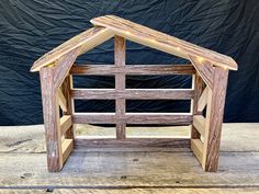 a small wooden structure made out of wood