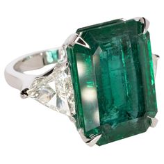 Luxury Trillion Cut Emerald Ring For Formal Occasions, Formal Trillion Cut Emerald Ring, Luxury Trillion Cut Diamond Emerald Ring, Luxury Trillion Cut Emerald Diamond Ring, Luxury Gia Certified Trillion Cut Emerald Ring, Luxury White Gold Emerald Ring, Luxury Gia-certified Trillion Cut Emerald Ring, Luxury Diamond-cut Emerald Ring, Luxury Antique White Gold Emerald Ring