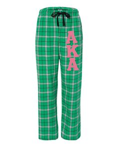 the green plaid pajama pants with pink letters