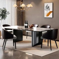 a dining room table with chairs and a vase on the floor in front of it