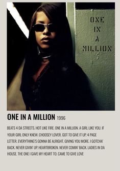 a woman wearing sunglasses standing in front of a sign that says one in a million