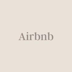 the word air bnb in grey on a white background