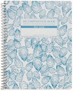 a notebook with blue flowers on the front and bottom cover, which reads decopostition book