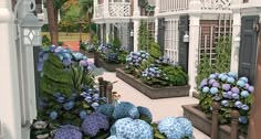 an artist's rendering of a garden with blue and purple flowers