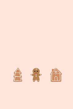 three gingerbreads and a house on a pink background