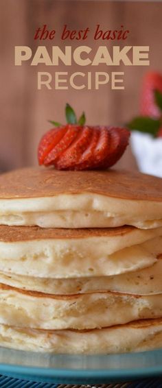 a stack of pancakes on a blue plate with strawberries in the background and text overlay