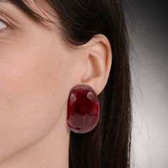 Introducing our stunning Ruby-Burgundy Marbled Resin Semi-Hoop Clip-On Earrings, crafted for lovers of rich and vibrant red hues. These earrings feature a beautiful marbled resin design in shades of ruby and burgundy, creating a captivating and luxurious color palette. The richness of the red tones in these earrings makes them a standout accessory that is sure to become a favorite in your collection. The marbled resin adds depth and texture to the color, enhancing the overall elegance and sophis Red Gem Earrings, Elegant Red Round Hoop Earrings, Red Elegant Round Hoop Earrings, Elegant Red Hoop Earrings For Formal Occasions, Elegant Red Hoop Jewelry, Red Hoop Jewelry For Formal Occasions, Red Pierced Hoop Earrings For Party, Red Clip-on Earrings For Wedding, Red Pierced Hoop Earrings