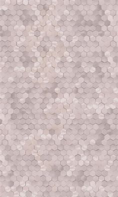 an abstract pattern with hexagonal tiles in grey and white colors on a beige background