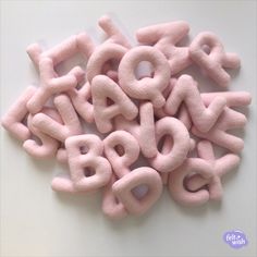 the letters are made out of pink felt