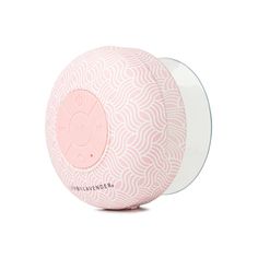 the bath ball is pink and has an interesting pattern on it's surface, as well as a clear lid