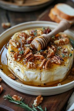 a bowl filled with cheese covered in nuts