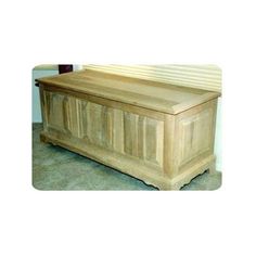 a large wooden chest sitting on top of a floor