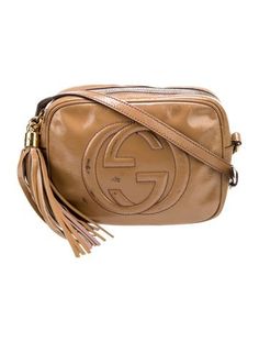 Gucci Crossbody BagBrown Patent LeatherGold-Tone HardwareSingle Adjustable Shoulder StrapTassel AccentsCanvas Lining & Dual Interior PocketsZip Closure at Top Soho Disco Bag, Gucci Crossbody, Soho, Cross Body Handbags, Women Handbags, Gucci, Handbags