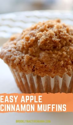 a close up of a muffin on a plate with the words easy apple cinnamon muffins