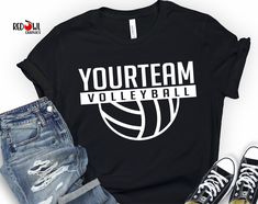 a t - shirt that says you're team volleyball next to ripped jeans and sneakers