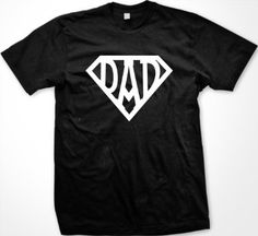 a black t - shirt with the word dad printed on it and a white superman symbol