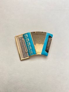 "Gold-tone blue enamel accordion brooch pin.  Approximately 1-1/4\" by 1-7/8\"  Not intended for children ages 13 and under.   Also, for many items we can accommodate large orders, so please send us a message." Instrument Jewelry, Gift For Music Lover, Pin Jewelry, Music Lover, Music Lovers, Jewelry Gift, Gift For Lover, Zinc Alloy, Brooch Pin