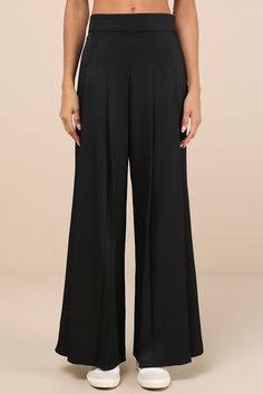 Become the office style muse with a versatile piece like the Lulus Sophisticated Inspiration Black High-Rise Wide-Leg Trousers! Sleek woven fabric shapes these must-have trousers that feature a high, banded waist and chic wide pant legs with timeless pleated details and full-length hems. Elastic at back for fit. Hidden side zipper/clasp. Fit: This garment fits true to size. Length: Floor length. Size medium Inseam: 31.00 Front Rise: 13.50 Waist: Fitted - elastic waist allows stretch. Hip: Loosel Wineries Outfit, Style Muse, Pleated Trousers, Office Style, Wide Pants, Office Fashion, Wide Leg Trousers, Side Zipper, The Office