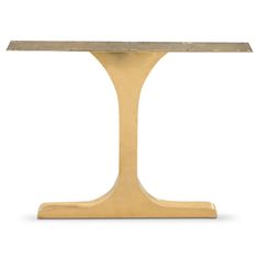 a table that is made out of wood and has an oval shaped base with a curved edge