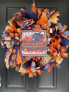 a wreath that says falling leaves and pumpkins please