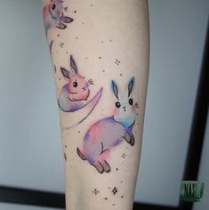 the legs are painted with watercolors and have bunnies on them, as well as stars