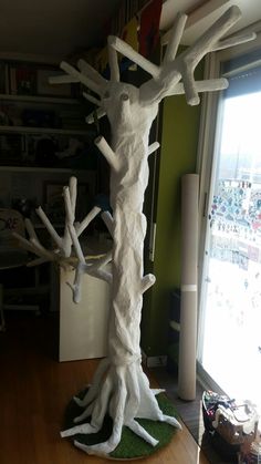 this is a fake tree made out of paper machs