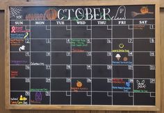 a chalk board with the calendar written on it