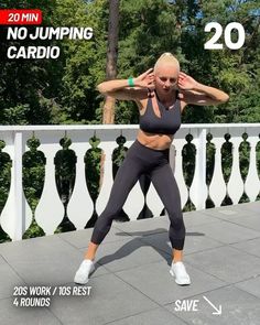 a woman in black sports bra top and leggings doing exercises with her hands behind her head