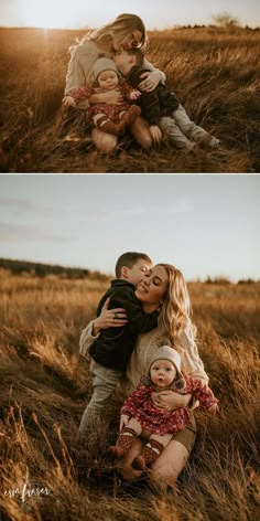 two women and a baby are sitting in the grass with their arms around each other