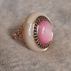 Like New, Gorgeous Barbie Pink And Pristine White Mother Of Pearl Set In A Delicate And Feminine Rose Gold Over Sterling Silver. Invest In Quality,Heirloom Jewelry That You Will Love To Give As A Gift Or Own Yourself . Firm. White Luxury Sterling Silver Ring, Luxury White Rings Stamped 925, White Rings With Gemstone Accents, Elegant Handmade Pink Ring, Elegant Handmade Pink Rings, Elegant Pink Cabochon Rings, White Rings With Gemstone Accents For Gift, Fine Jewelry Pink Cabochon Ring, Heirloom Jewelry