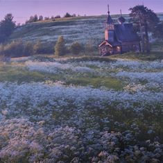 an old church sits on top of a hill surrounded by wildflowers and trees