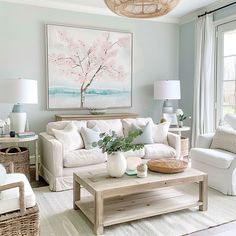 Modern cottage living room, spring blossoms theme with light and airy hues like soft pinks, light greens, and sky blues, creating a fresh and uplifting atmosphere3 Airy Decor