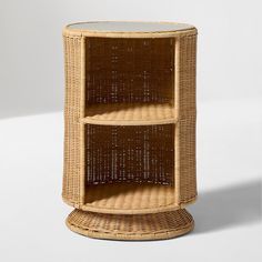 a wicker shelf with three shelves on each side