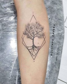 a small tree tattoo on the right arm and leg, with an inverted triangle in the middle