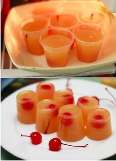 there are many cups with cherries in them on the plate and one is filled with orange juice