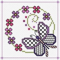 a cross stitch pattern with flowers in the middle and a frame around it that has an image of a butterfly