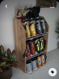 there are many pairs of shoes on the shelf next to each other in this room