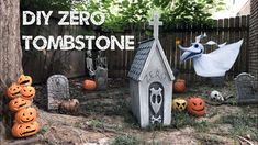 an outdoor halloween yard with pumpkins and decorations