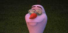 a cartoon character with sunglasses and a carrot sticking out of it's nose, standing in the grass