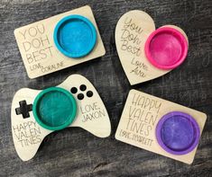 three wooden game controllers with happy valentine's day messages on them