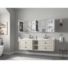 a bathroom with two sinks and a bathtub next to a wall mounted medicine cabinet