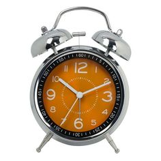 an orange alarm clock with two bells on the front and side of it's face