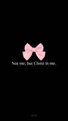 a pink bow with the words not me, but christ in me